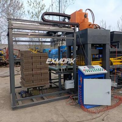 La machine de fabrication de briques entièrement automatique est conçue et fabriquée par Exmork Machinery